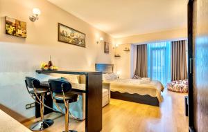 Postel nebo postele na pokoji v ubytování Studio Apartment NFT New Gudauri 215