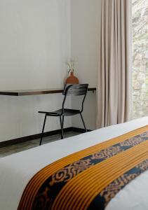 Voodi või voodid majutusasutuse DUNIA LOMBOK - Villas with Ocean View toas