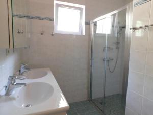 a bathroom with a sink and a shower at Villa 54 - Plage Aiguebelle 250m in Le Lavandou +35 photos