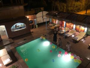an overhead view of a pool with balls in it at Mama Africa Apts & Studios in Luxor