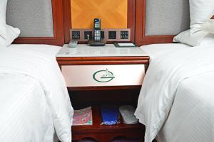 Voodi või voodid majutusasutuse Hotel Guia toas