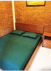 Cama o camas de una habitación en Berkah Homestay
