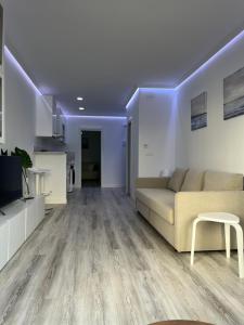 Część wypoczynkowa w obiekcie Sol y 1ª linea de playa Urbanización Lubina sol