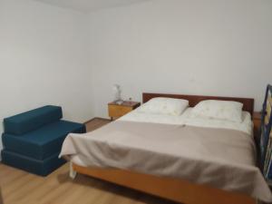 Ein Bett oder Betten in einem Zimmer der Unterkunft Milica app Skradinsko polje 24