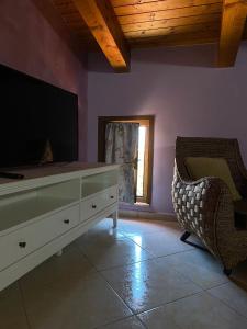 TV a/nebo společenská místnost v ubytování beucarnea apartment salerno + 5 fotografií