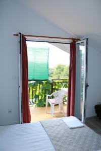 Postel nebo postele na pokoji v ubytování Olive apartments 3