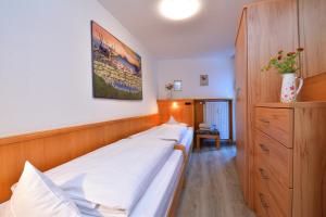 Posteľ alebo postele v izbe v ubytovaní Familienhotel Kleinwalsertal