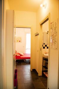A bed or beds in a room at La Casetta B&B