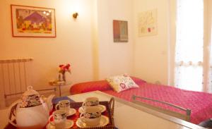 A bed or beds in a room at La Casetta B&B