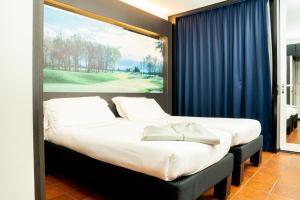 Posteľ alebo postele v izbe v ubytovaní Hotel Pineta + 30 fotografií