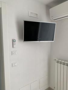 TV a/nebo společenská místnost v ubytování LA CASA DI PIETRA