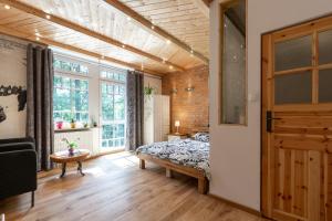 Posteľ alebo postele v izbe v ubytovaní Apartamenty Pod Skocznią