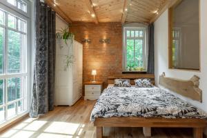 Posteľ alebo postele v izbe v ubytovaní Apartamenty Pod Skocznią