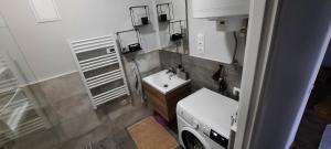 Koupelna v ubytování Lezser apartman + 14 fotografií