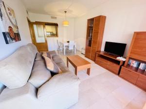 A television and/or entertainment centre at A436 - Balcón del Mar - 2004 Finestrat s.l.
