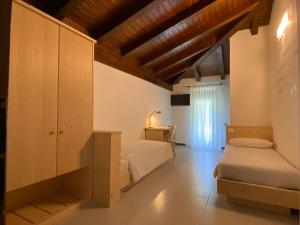 Postel nebo postele na pokoji v ubytování B&B Stari Mlin - Vecchio Mulino
