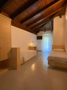 Postel nebo postele na pokoji v ubytování B&B Stari Mlin - Vecchio Mulino
