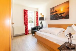 Postel nebo postele na pokoji v ubytování Hotel Oberwirt Wangen