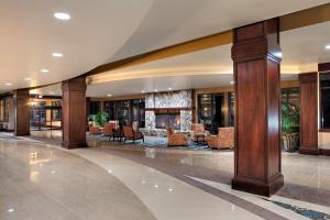 a lobby of a hotel with a fireplace at Seven Feathers Casino Resort in Canyonville