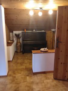 Kuchyň nebo kuchyňský kout v ubytování B&B A'la Funtäna