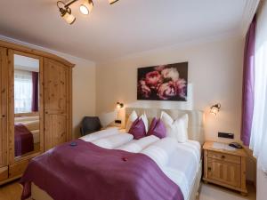 A bed or beds in a room at Appartements Fortuna
