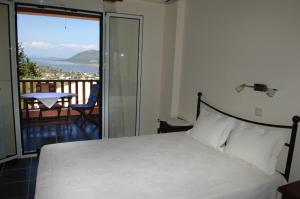 Postel nebo postele na pokoji v ubytování Harmony Villas + 37 fotografií