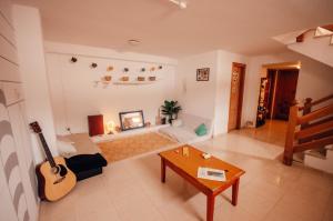 Postel nebo postele na pokoji v ubytování International Surf Camp ONLY SURF