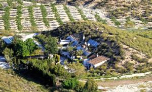 an aerial view of a house on a hill at Cuevas Andalucia in Baza