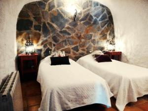 Cuevas Andalucia客房内的一张或多张床位
