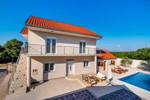 an image of a villa with a swimming pool at kuća za odmor ZARA in Stankovci