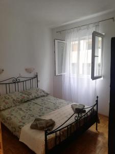 Posteľ alebo postele v izbe v ubytovaní Apartment BUBA