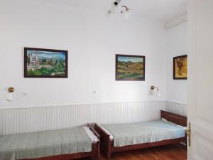 Postel nebo postele na pokoji v ubytování Atelier Keszthely
