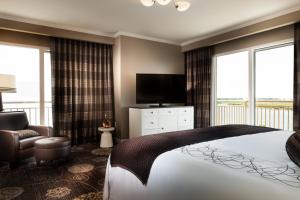 Postel nebo postele na pokoji v ubytování Golden Nugget Lake Charles