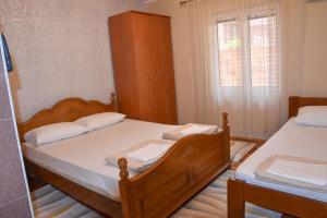 Postel nebo postele na pokoji v ubytování Apartmani Masa