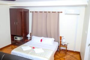 Кровать или кровати в номере Will's Sea View Apartments