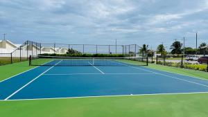 Tenis a/nebo squash v ubytování Aquamarine Resort-style Vacations nebo okolí