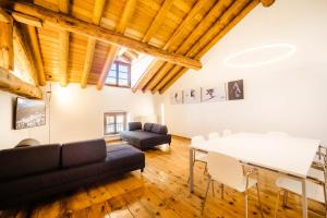 Posezení v ubytování Alp Apartments SKI & BIKE - Xavier + 37 fotografií