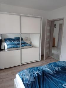Posteľ alebo postele v izbe v ubytovaní Sielankowy Domek
