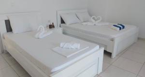 Postel nebo postele na pokoji v ubytování Orea Hotel