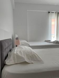 Postel nebo postele na pokoji v ubytování Orea Hotel