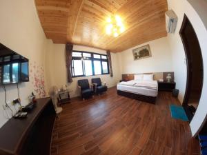 TV a/nebo společenská místnost v ubytování Jiufen Yunhai Yazhu Homestay