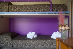 Poschodová posteľ alebo postele v izbe v ubytovaní SoleLuna