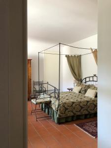 Postel nebo postele na pokoji v ubytování Agriturismo La Casa in Collina