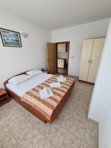 Postel nebo postele na pokoji v ubytování Villa Ancora