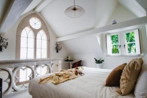 Postel nebo postele na pokoji v ubytování B&b kleinen bosch