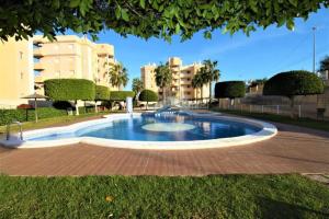 a large pool with a fountain in a park at apartamento Cala Flores nº VV MU5868-1 in Cabo de Palos