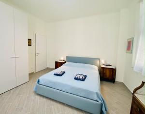 Posteľ alebo postele v izbe v ubytovaní Hostdomus - Trilocale Da Dino