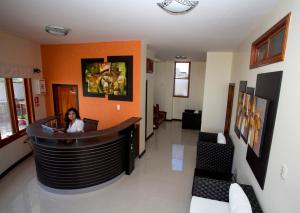 TV a/nebo společenská místnost v ubytování Hotel La Laguna Galapagos