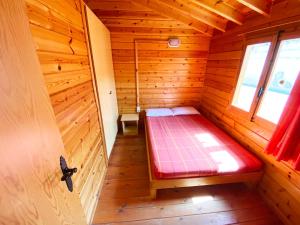 Postel nebo postele na pokoji v ubytování Bungalows Camping Ferrer