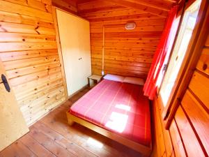 Postel nebo postele na pokoji v ubytování Bungalows Camping Ferrer